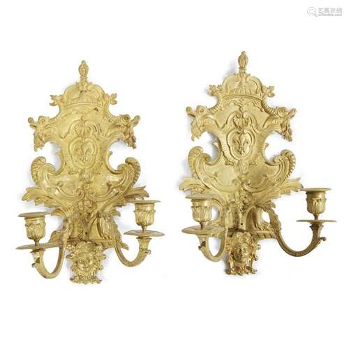 A pair of Renaissance Revival gilt-brass wall