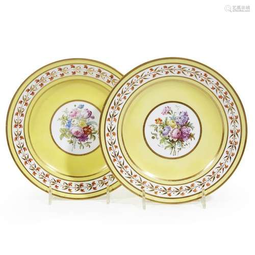 A pair of Sèvres hand-painted and parcel-gilt porcelain