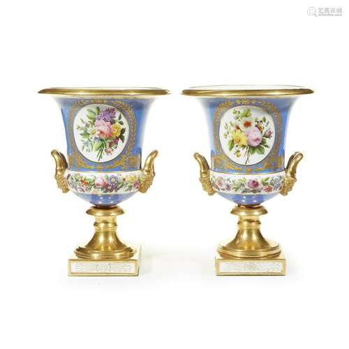 A pair of blue ground and gilt and polychrome decorated