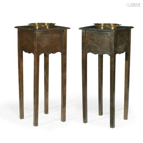 A pair of George III mahogany and brass wine coolers,