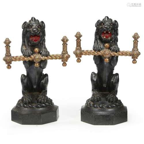 A pair of Victorian painted and gilt iron fire dogs,
