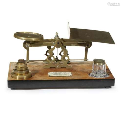 A Victorian walnut and brass mail scale, late