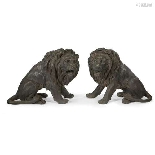 A large pair of patinated spelter garden lions, 20th