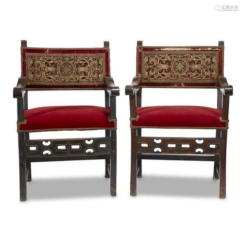 A pair of Italian Renaissance style walnut armchairs,