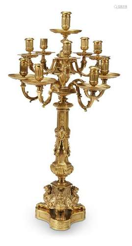 A large Louis XIV style ormolu eleven-light candelabra,