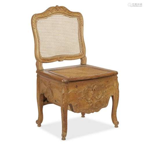 A Régence beechwood chaise d'aisance, second quarter