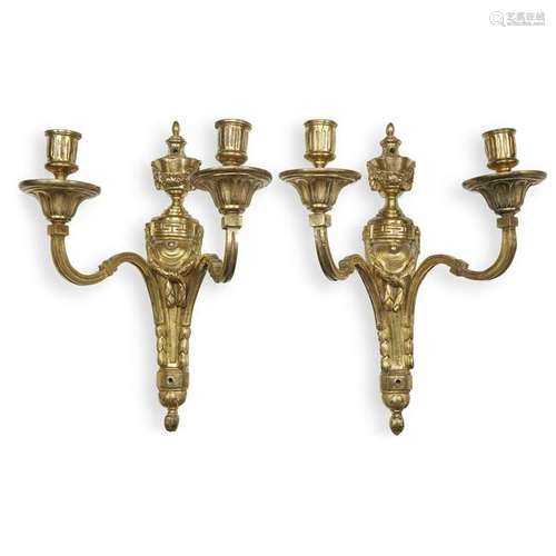 A pair of Louis XVI ormolu two-light appliques, late