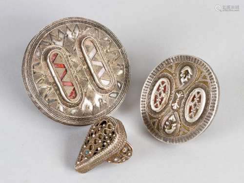 Three Kazakh silver rings of different size and sh…