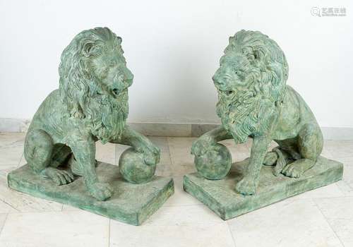 Pair of large bronze lions in sitting position wit…