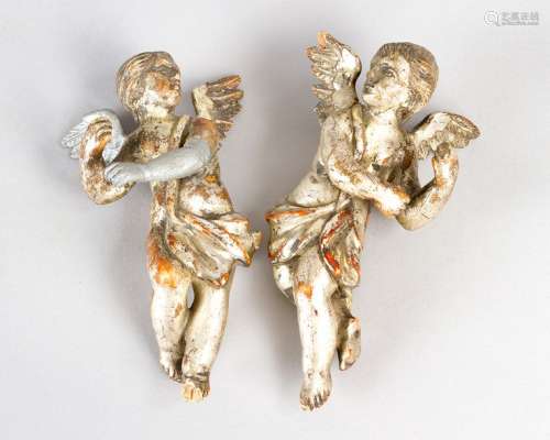 Pair of miniature angels. Wood carved with origina…