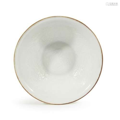 A Chinese molded porcelain white-glazed bowlqing