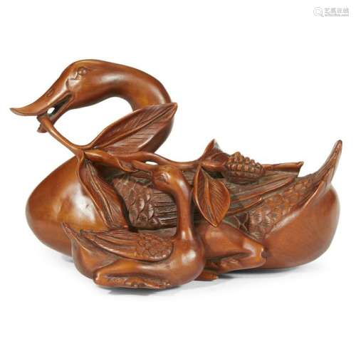 A Chinese carved boxwood figure of two ducks and millet