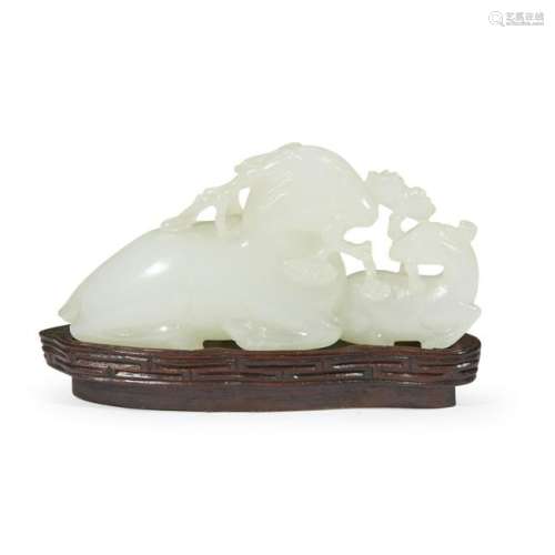 A small Chinese white jade carving of a deer and