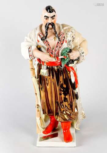 Russian Porcelain Figure, of a bojar with pipe and…