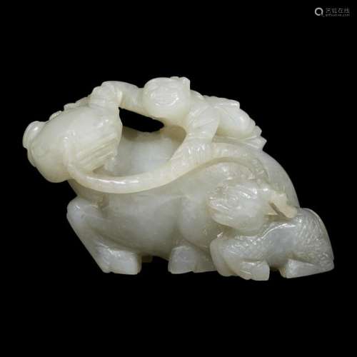 A Chinese carved pale celadon-grey jade 