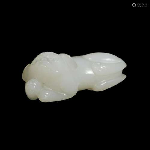 A small Chinese white jade carving of a recumbent beast