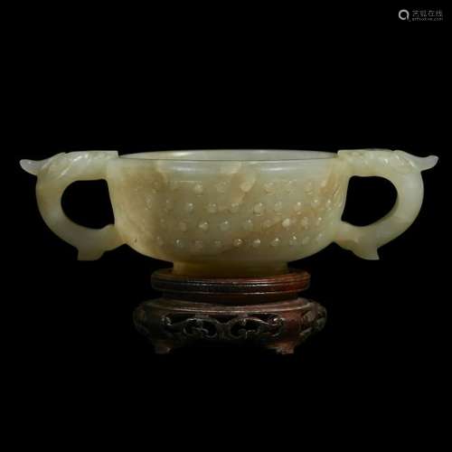 A Chinese archaistic mottled celadon-grey jade libation