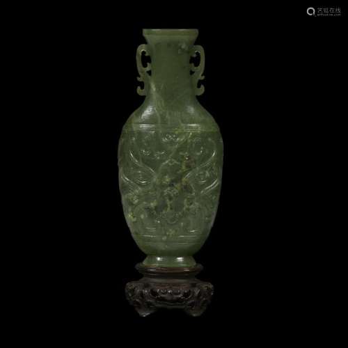 A Chinese carved spinach jade small archaistic vase