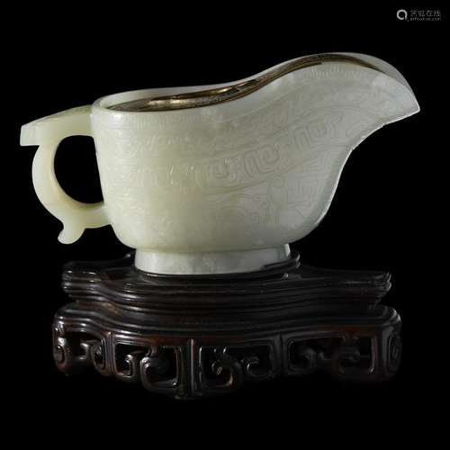 A Chinese carved white jade guang-form water coupe qing