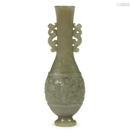 A small Chinese carved celadon jade archaistic vase