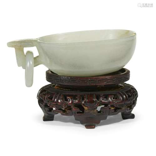 A Chinese greyish-white jade oval handled cup qing