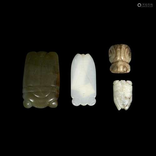 A group of three Chinese carved jade cicada pendants