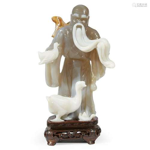 A carved agate figure of Wang Xizhi. Cleverly carved