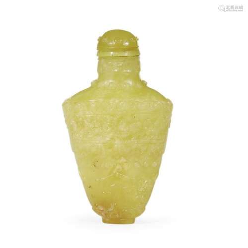 A Chinese carved yellow hardstone snuff bottle and