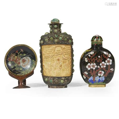 Two Chinese snuff bottles and a cloisonnÃ© snuff dish.