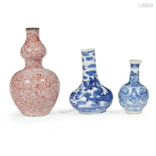 A group of three Chinese porcelain miniature vases qing