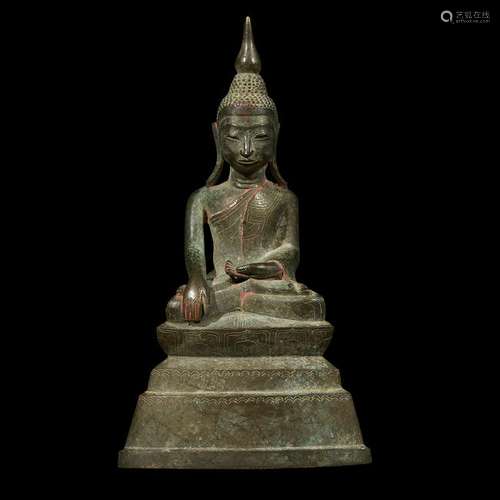 A Burmese or Northern Thai bronze seated Buddha. On a