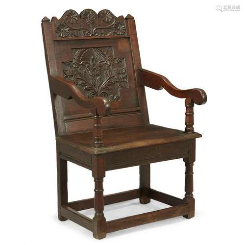 A Jacobean carved oak wainscot chair possibly Scottish,