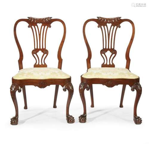 A fine pair of George II carved mahogany side chairs