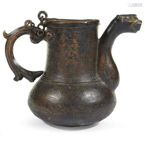 A German bronze ewer with zoomorphic spout possibly