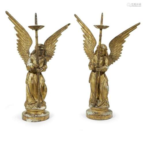 A pair of Gothic Revival gilt cast iron angel-form