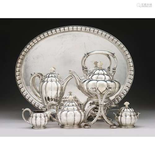 A German silver tea and coffee service retailed by