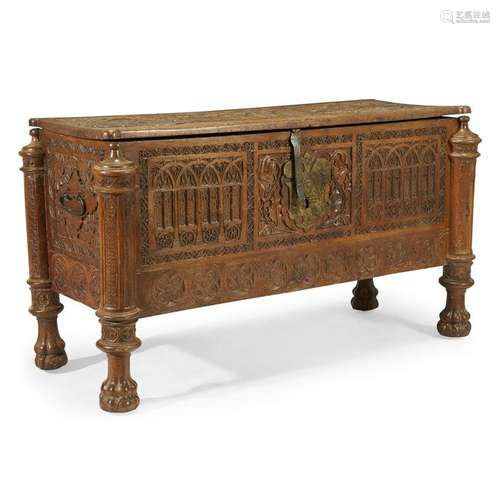 A Spanish Gothic style iron-mounted carved walnut chest