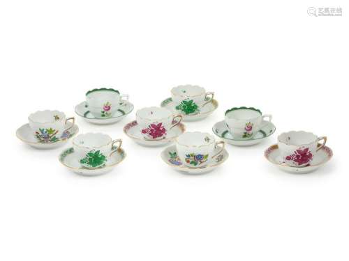 A Set of Eight Herend Teacups and Saucers Height of