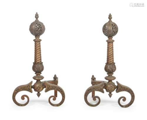 A Pair of Brass Andirons Height 25 3/4 inches.