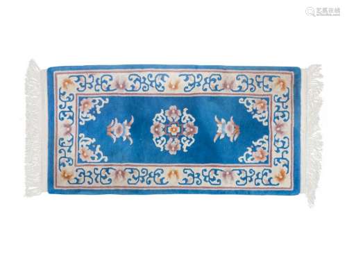 A Chinese Wool and Silk Blue Rug 4 feet 1 inch x 2 feet