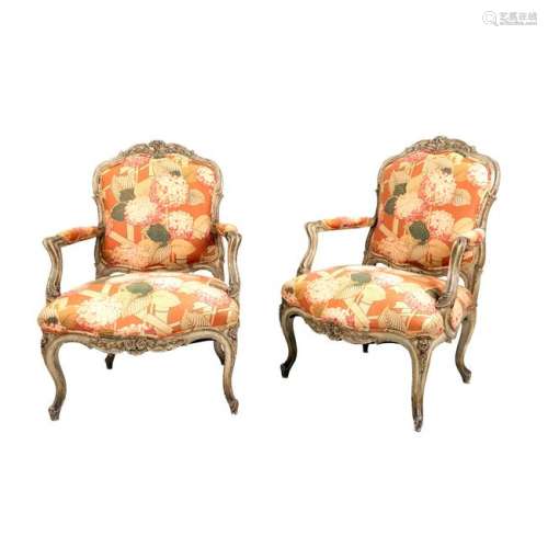 A Pair of Louis XV Style Carved and Painted Fauteuils
