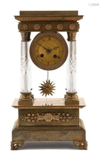 A Charles X Gilt Bronze and Crystal Portico Clock