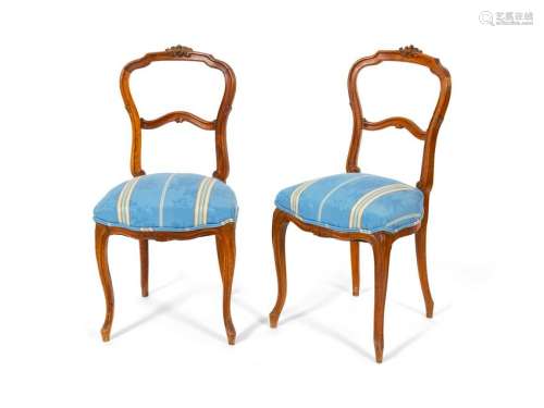 A Pair of Victorian Carved Walnut Lady's Chairs