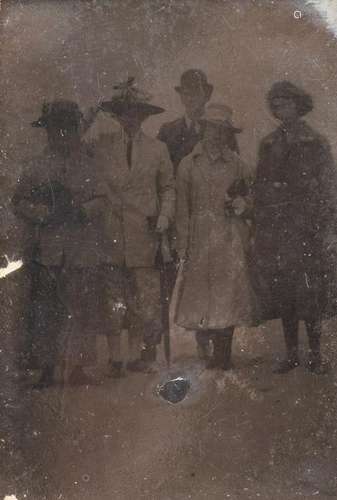 A Tintype Portrait of a Family 4 1/2 x 3 inches.