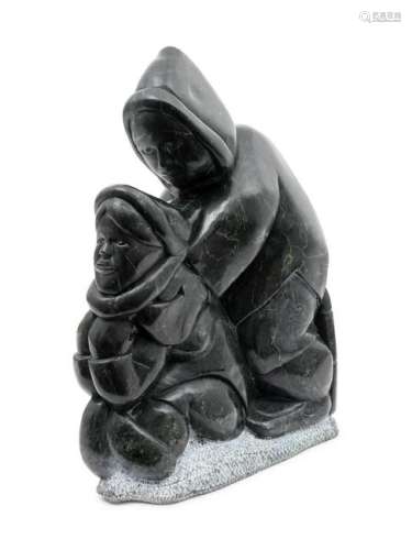 A Valwktwrwk Inuit Carved Stone Sculpture of a Woman