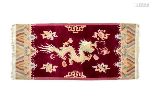 A Chinese Wool Rug 57 1/2 x 27 inches.