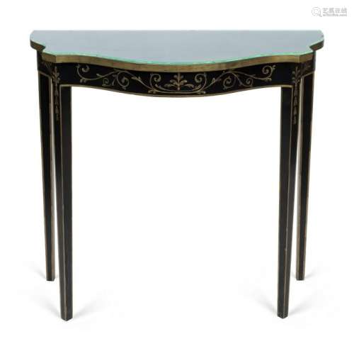 A Hollywood Regency Style Black and Gilt Painted