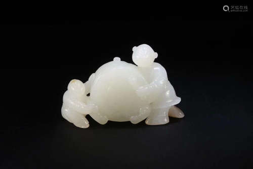 HETIAN JADE 'TONGZI' SCULPTURE