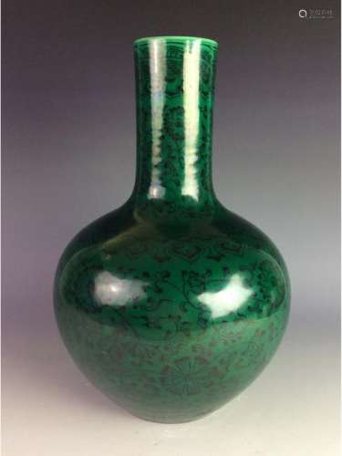 Chinese green  baluster form vase  with floral motif