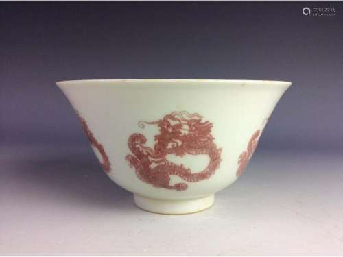 Chinese bowl with under glaze red dragon mark on base.
